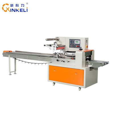 KL-450D新科力带拖盒瓜果蔬菜包装机新鲜瓜果包装机水果自动带拖盒包装机